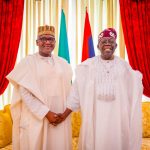 Chairman, Dangote Group, Aliko Dangote and President Bola Tinubu in a handshake at the Presidential Villa, Abuja.
